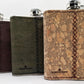 Hip flask covered with cork